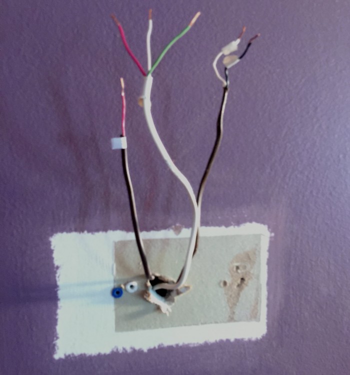 unpainted-wall-behind-old-thermostat.JPG