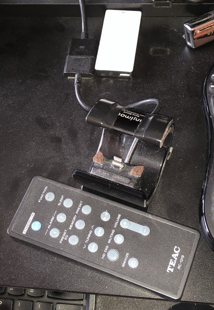 dust-collecting-on-old-cradle-and-remote.JPG